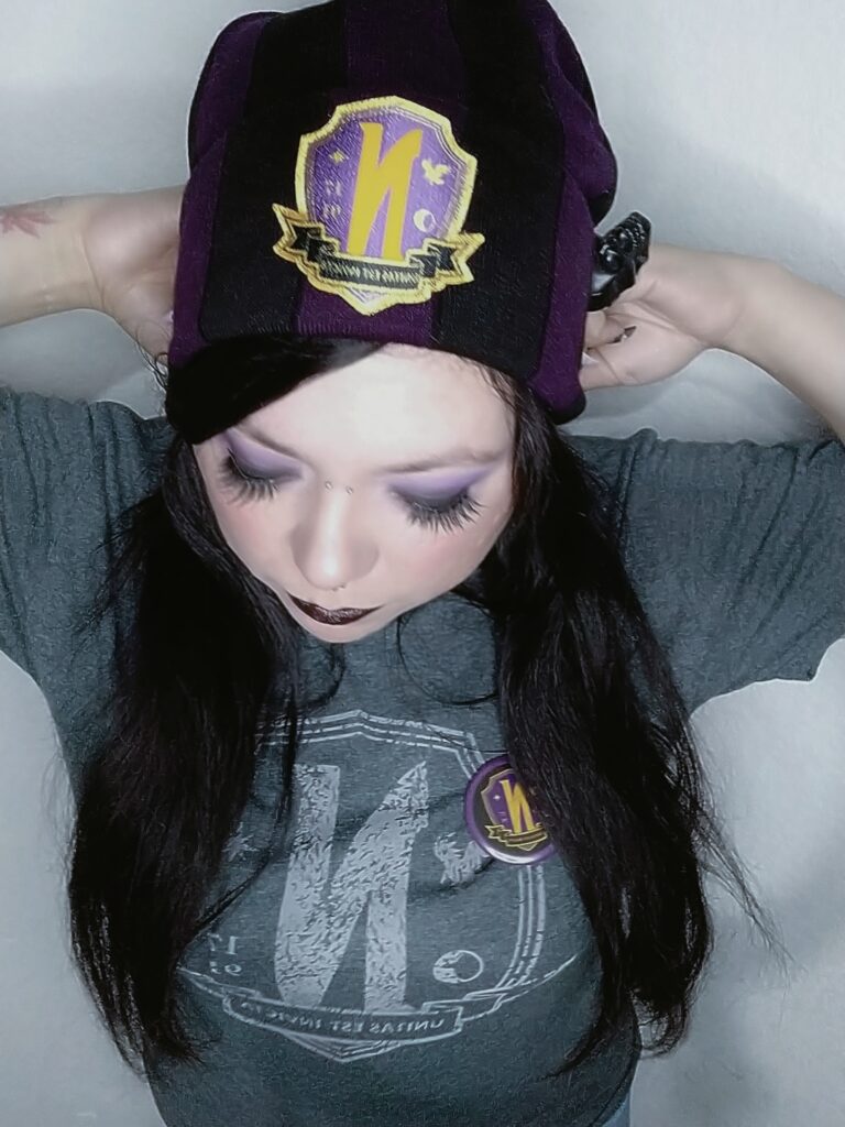 kathdollmeow with beanie, tim burton girl, nevermore academy, netflix , kathdollmeow gorgeous gamer girl, beautiful gamer girl. female vocalist, female singer, black long hair pale skin light eyes, dark princess pastel goth